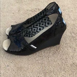 Toms black sequin wedge shoes.